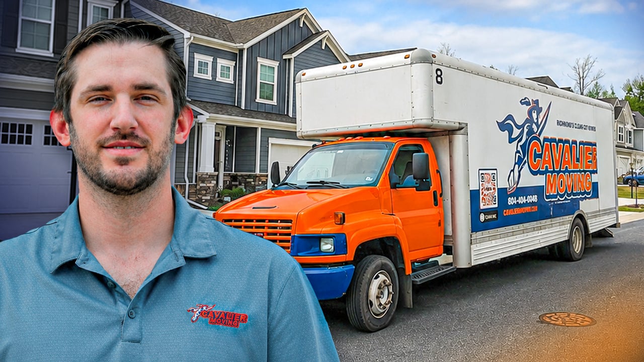Cavalier Moving owner in front of a moving truck